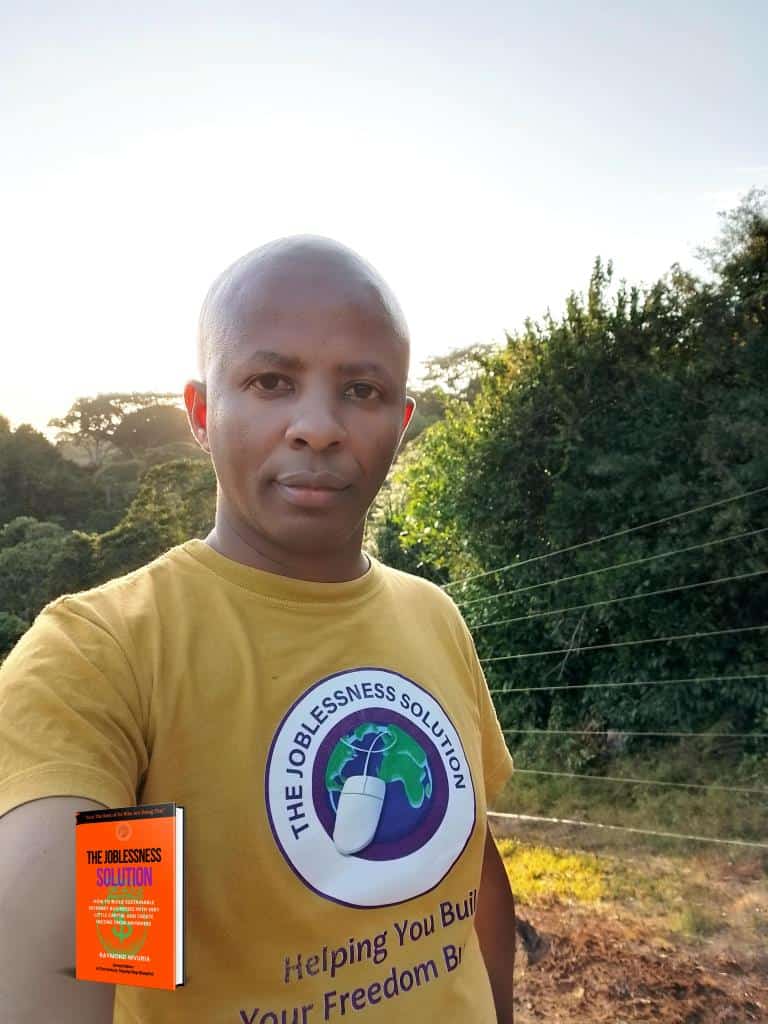 Man wearing "The Joblessness Solution" T-shirt outdoors.